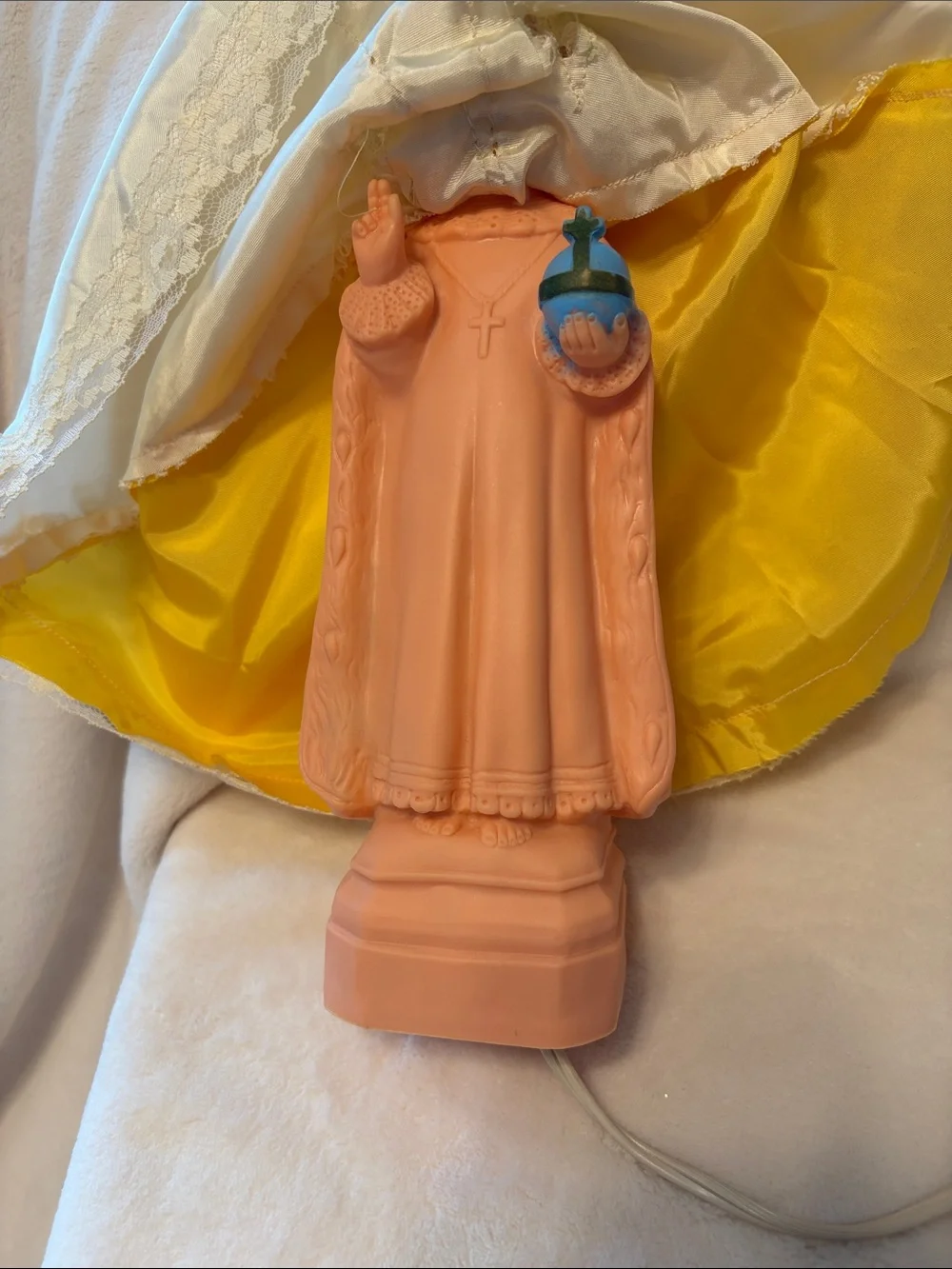 Vintage infant Jesus of Prague with light